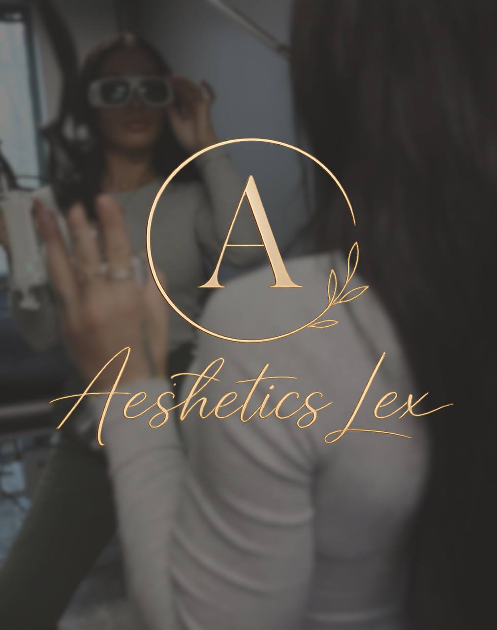Aesthetics Lex provider preparing a laser treatment in the mirror